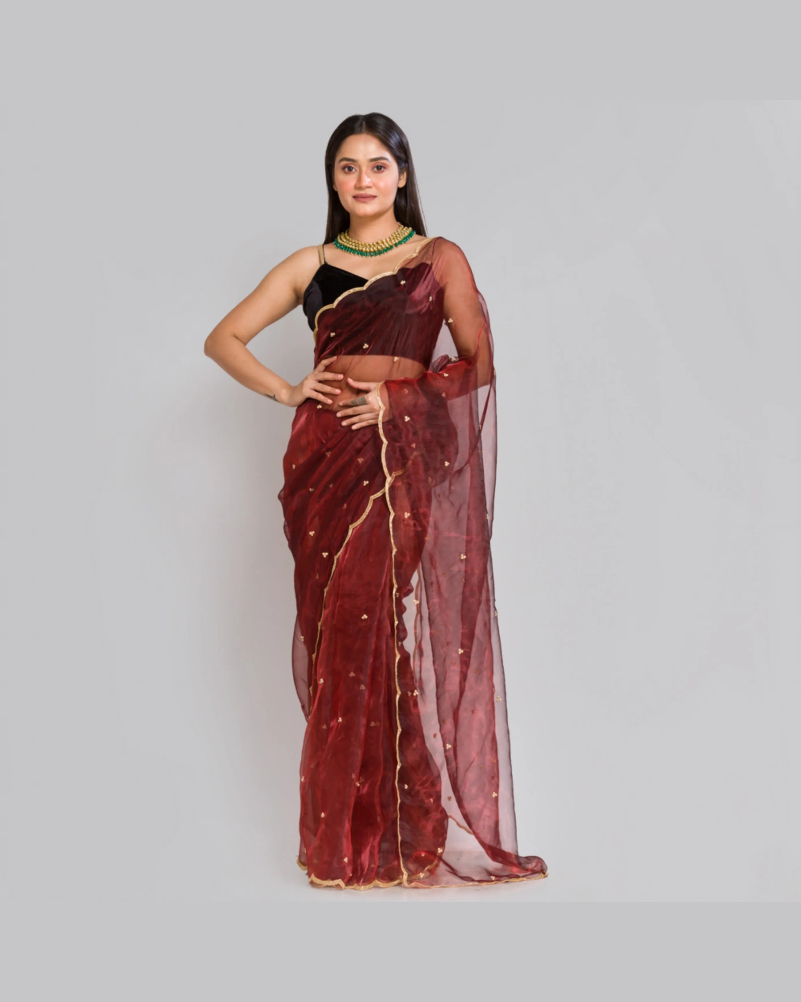 Maroon glass tissue saree with Handembroidered scalloping